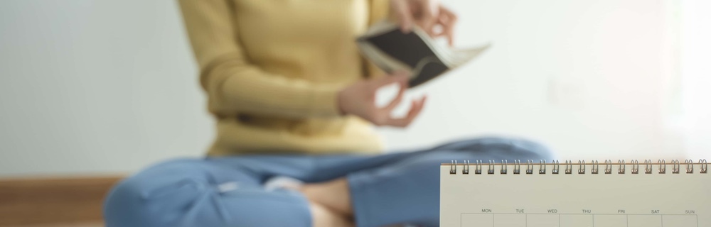 the stressed person sitting on the floor opening empty wallet