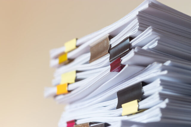 Pile of student homework that assigned to student to be complete